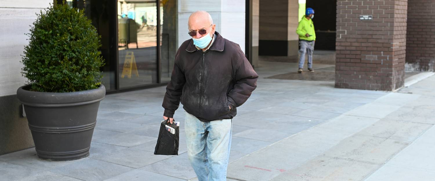 Prospective juror practising mindful breathing outside courthouse