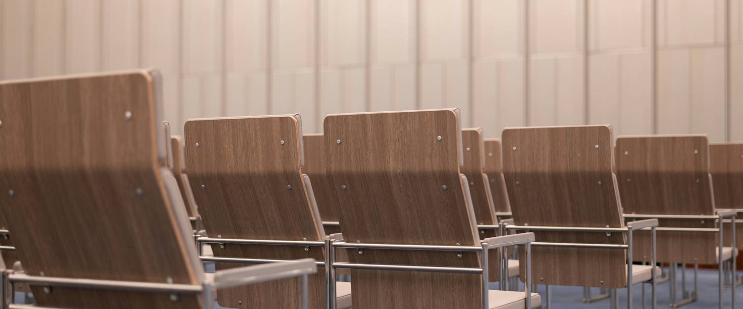 Citizens seated in a deliberation room fulfilling the importance of jury duty in Ontario